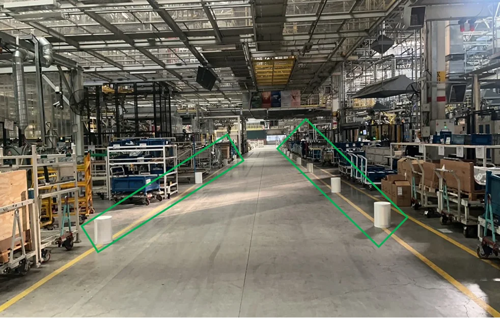 Factory aisle marked for laser navigation feature assessment